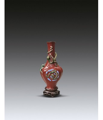 A Chinese Red Glazed Chi Dragon Flower Inserter Mid Qing Dynasty