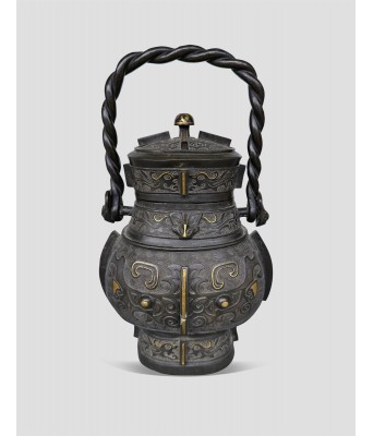 明代官造错金银饕餮纹铜提梁卣 1368-1644
