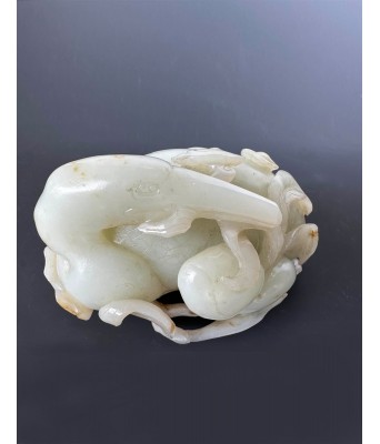 A Chinese White Jade Bird and Peach Late Ming Early Qing