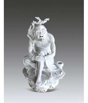 A Chinese White Glazed Luohan With jingdezheng He Shuigen Mark