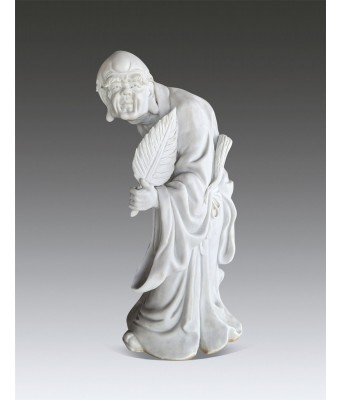 A Chinese White Glazed Luohan With jingdezheng He Shuigen Mark